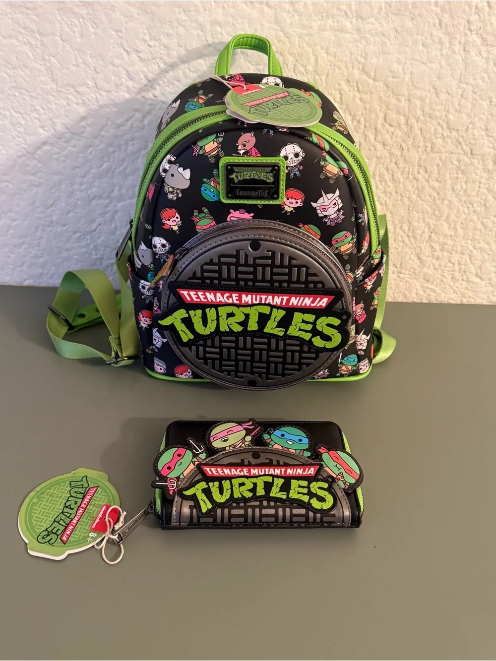 Loungefly: Teenage Mutant Ninja Turtles Sewer Cap AOP Mini Backpack and Wallet